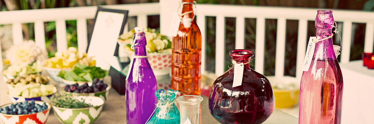 a group of wine bottles sitting on top of a table.